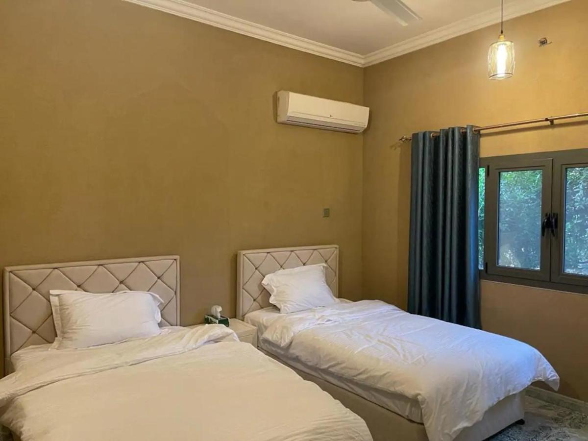 Rose Guesthouse Al 'Aqar Екстериор снимка