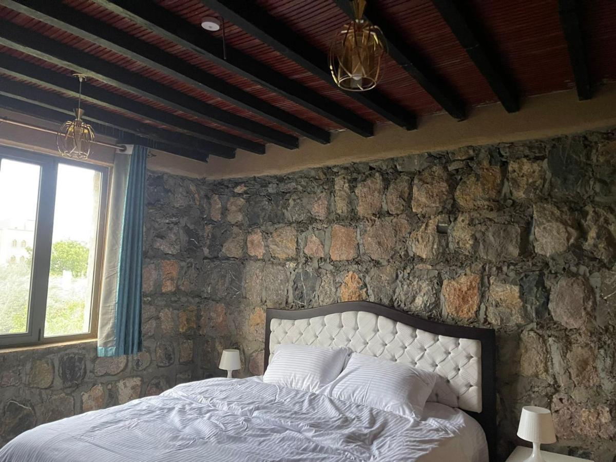 Rose Guesthouse Al 'Aqar Екстериор снимка